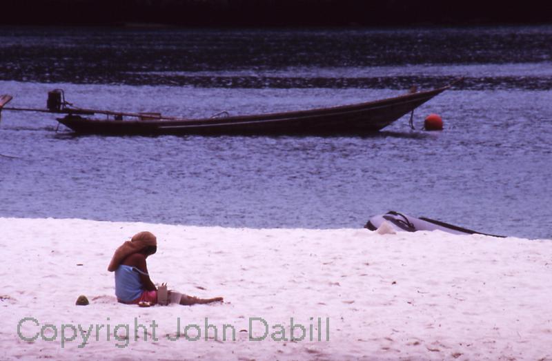 Boat and Girl on beach